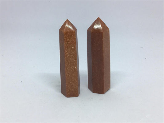 Gold sand stone tower