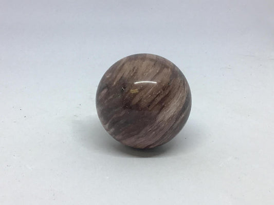 Silky banded chocolate sphere